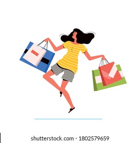 Young shopping woman holds packages from the store in her hands and jumps happily. The concept of a successful purchase and the joy of discounts