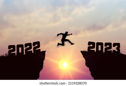 A young silhouette man jump between 2022 and 2023 years over the sun and through on the gap of hill evening sky. Business concept. Welcome Happy New Year 2023. Vector illustration.