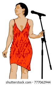 Young singer in a dress with a microphone on a white background