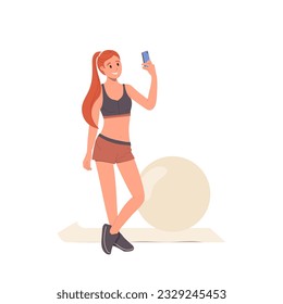 Young slim woman with perfect figure taking selfie shot by phone camera after training with fitball