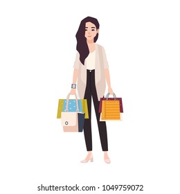 Young smiling brunette woman dressed in casual clothing holding shopping bags isolated on white background. Long haired girl with her purchases, shopaholic. Flat cartoon colorful vector illustration