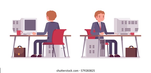 Young smiling businessman sitting at the desk and working at the computer, looking at screen, developing a business plan, comfortable office workplace, front and rear view, isolated, white background