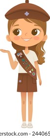 Young smiling girl scout wearing sash with badges isolated on white background. Female scouter, Brownie ligue Scout Girls troop