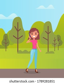 Young smiling girl wearing pink t-shirt and jeans, stylish shoes at heels. Fashionable woman with bob hairstyle walking in green park or in wood. Cheerful girl posing, talking by phone. Summer nature