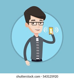 Young smiling man holding ringing mobile phone. Caucasian man answering a phone call. Man standing with ringing phone in hand. Vector flat design illustration in the circle isolated on background.