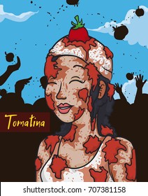 Young smiling woman covered with tomatoes and a multitude celebrating the tomato throwing event or Tomatina Festival.