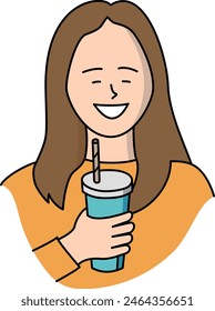 Young smiling woman drinking cold drink with paper straw