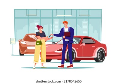 Young smiling woman getting key to a new car