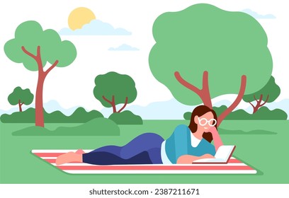 Young smiling woman reading book in park. Summer picnic on grass. Girl lying on blanket. Outdoor leisure. People relax in nature. Enjoy of literature. Textbook studying