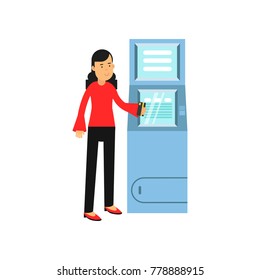 Young smiling woman standing near cash machine with payment card in hand. Cartoon female character in red blouse and black pants. Client of bank. Flat vector design