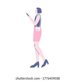 Young smiling woman standing in queue and looking at smartphone