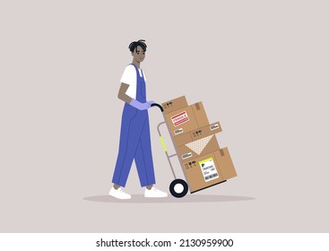 A young storage worker in denim overalls rolling a cart loaded with cardboard boxes, delivery service, cargo shipment