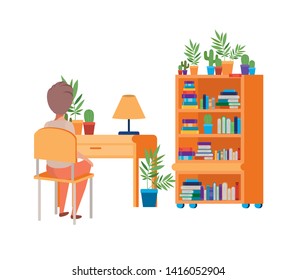 young student boy sitting in school desk