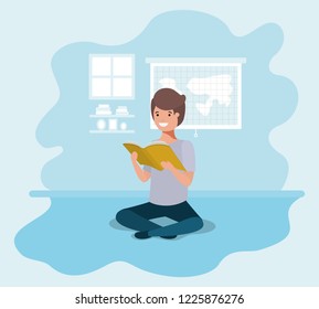 young student sitting reading book