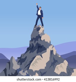 Young Successful businessman winner standing on peak mountain. Going to the top.