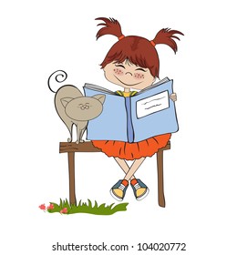 young sweet girl reading a book