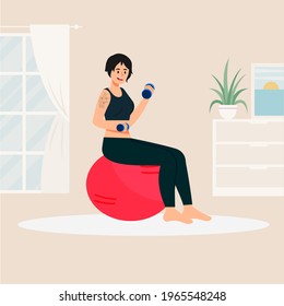 Young tattooed woman, doing exercise at home.