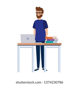 young teacher in desk with laptop and books
