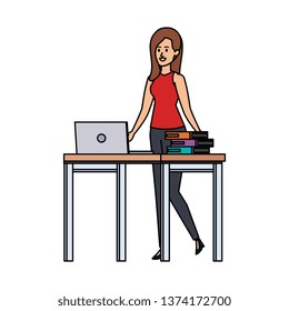 young teacher female in desk with laptop and books