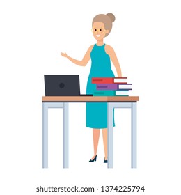 young teacher female in desk with laptop and books