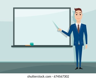 Young teacher standing in front of blackboard. Teacher teaching student in classroom at school, college or university.