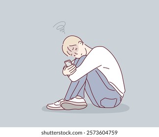 Young teenager boy suffering mobile cell phone addiction feeling lonely and depressed having insomnia needing to be connected sitting on floor. Hand drawn style vector design illustrations.	