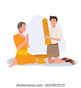 A young Thai student offers a candle to a monk during Khao Phansa at a temple