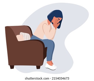 Young tired woman sitting on the sofa with her eyes closed, holding her head with her hand, suffering from severe sudden headache or migraine, throbbing pain. Stress worker. Business woman in a panic.