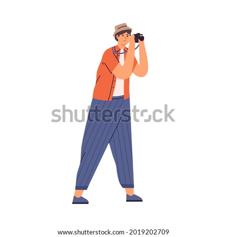 Young tourist holding camera and taking photo during sightseeing. Man shooting at trip. Travel photographer. Flat vector illustration of male traveler in hat isolated on white background