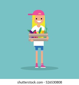 Young vegetarian blond girl holding a crate full of fruits and vegetables / editable flat vector illustration, clip art