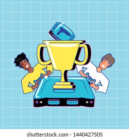 young video gamers with controls and trophy