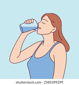  A young white woman with red hair enjoys a refreshing drink, sipping water through a straw from a glass. She wears a blue tank top and stands against a light blue background, quenching her thirst