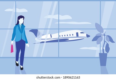 Young woman at the airport waiting for a flight on the background of the plane