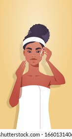 young woman applying face serum eye drop dressed in towel african american girl with clean fresh skin skincare spa facial treatment concept portrait vertical vector illustration