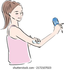 young woman applying sun screen