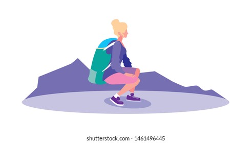 young woman backpacker in mountain landscape