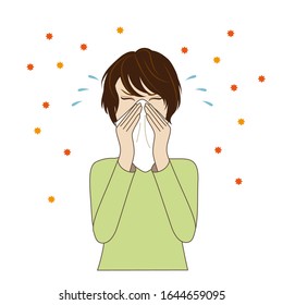 Young woman blowing her nose, hay fever