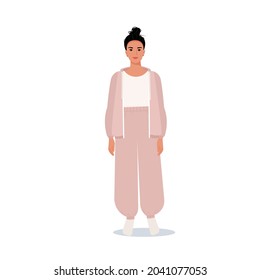 Young woman with a bunch on her head in a sports suit. Vector female character in flat style.