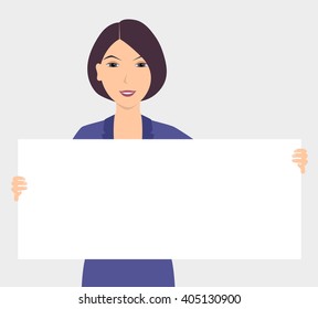 Young woman in business suit holding blank board (copy space) and smiling