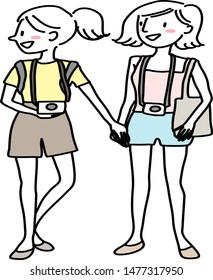 Young woman with camera. Cute female tourists with cameras walking hand in hand. Cheerful friends with cameras holding hands and enjoying sightseeing. Young tourist women walking hand in hand.