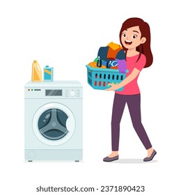 young woman carry dirty clothes in basket and will wash it