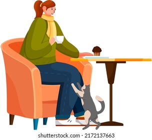 Young woman with cat in armchair of street cafe. Female pet owner sitting in restaurant with domestic animal. Caring for animals, joint pastime with pets concept. Girl with kitten spends time outdoor