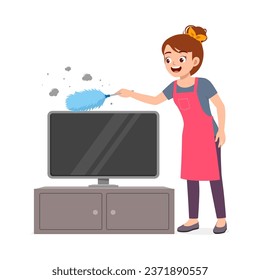 young woman cleaning dust from top of television