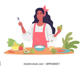 A Young Woman Cooking Healthy Meal In Her Kitchen