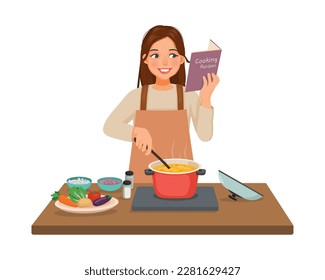 Junge Frau kochen in der Küche Rezitenbuch