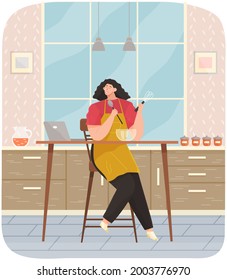 Young woman cooking salad in kitchen. Household activity, housekeeping, everyday duties and chores. Girl in kitchen room stands near table and watching culinary video blog on computer, healthy eating