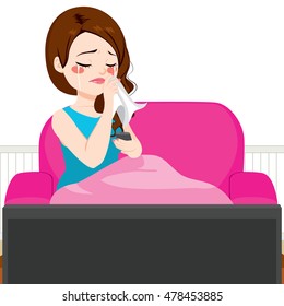 Young Woman Crying While Watching TV Movie Lying On Couch With Blanket