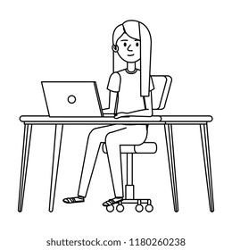 young woman at desk with laptop