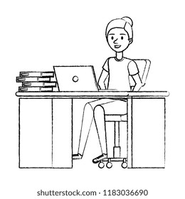 young woman at desk with laptop and books