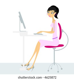 Young woman at a desk using her computer